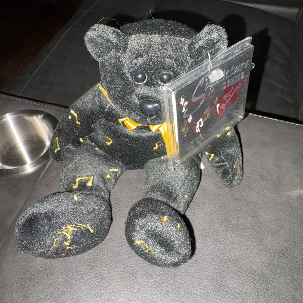 Black Plush Bear with Yellow Accents